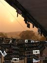 Duststorm sunrise with license plate offerings everywhere.